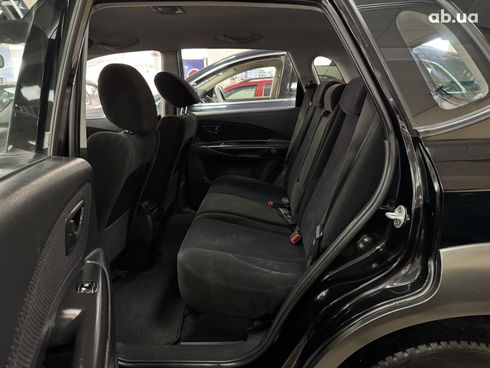 Hyundai Tucson 2009 черный - фото 14