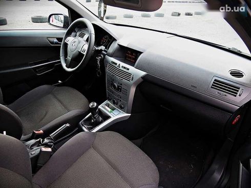Opel Astra 2009 - фото 15