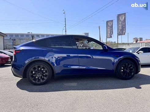 Tesla Model Y 2024 - фото 12