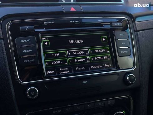 Skoda Superb 2012 - фото 28