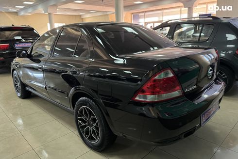 Nissan Almera 2012 черный - фото 9