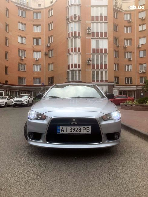 Mitsubishi Lancer 2008 серебристый - фото 10