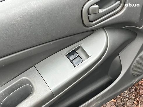 Nissan Almera 2008 черный - фото 85