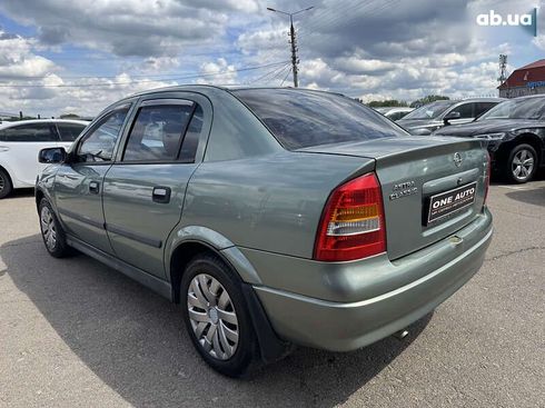 Opel Astra 2007 - фото 8