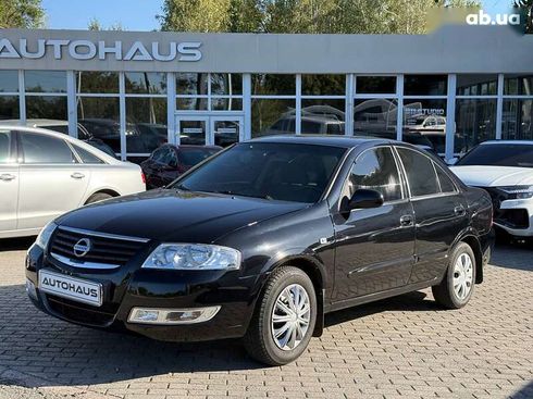 Nissan Almera 2012 - фото 3