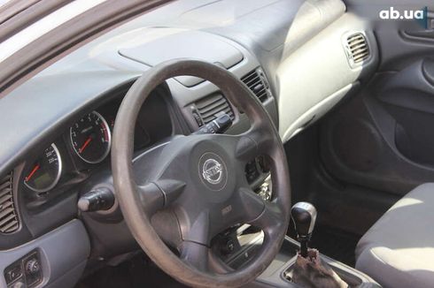 Nissan Almera 2005 - фото 13