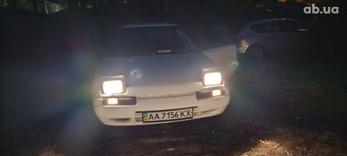 Mazda 323 1990 белый - фото 19