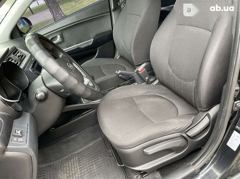 Kia Rio 2013 - фото 15