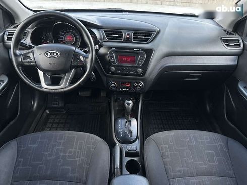 Kia Rio 2013 - фото 21