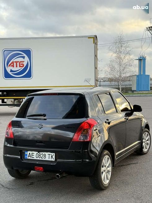 Suzuki Swift 2010 - фото 11