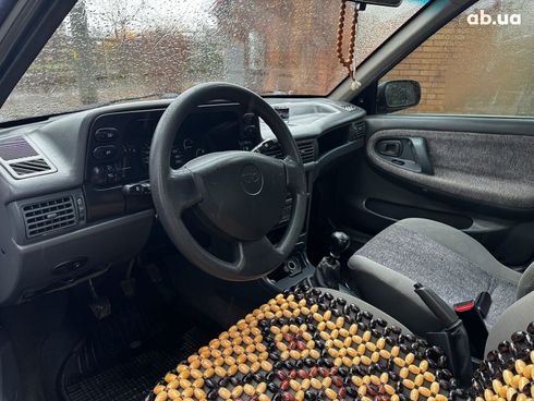 Daewoo Nexia 2006 серый - фото 11