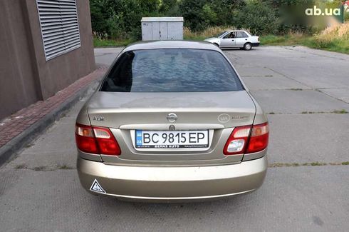 Nissan Almera 2004 - фото 11