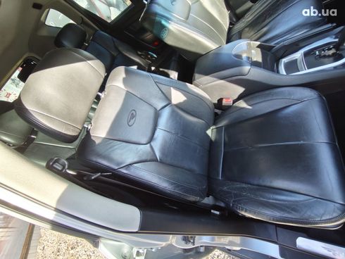 SsangYong Rexton 2010 серебристый - фото 14