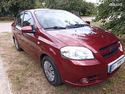 Chevrolet Aveo 2008 вишневый - фото 2