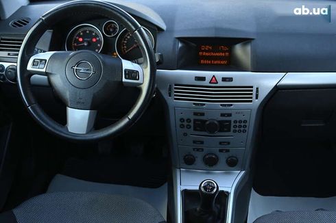 Opel Astra 2009 - фото 26