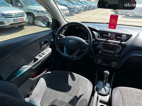 Kia Rio 2013 белый - фото 15