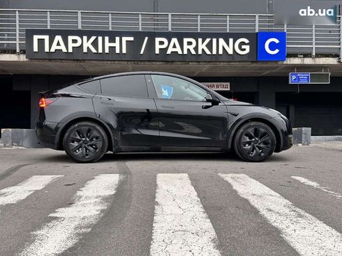 Tesla Model Y 2024 - фото 9