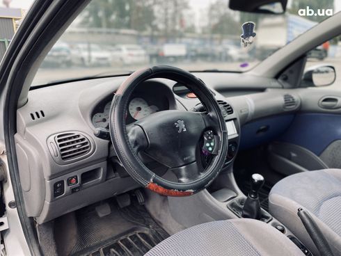 Peugeot 206 2002 серебристый - фото 12