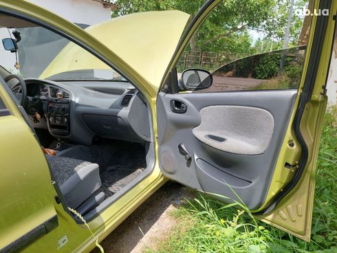 Daewoo Lanos 2006 золотистый - фото 7