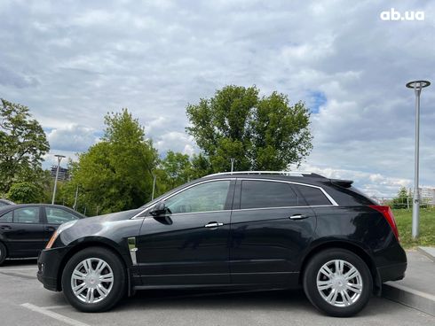 Cadillac SRX 2011 черный - фото 16