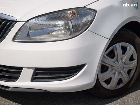 Skoda Fabia 2013 - фото 8