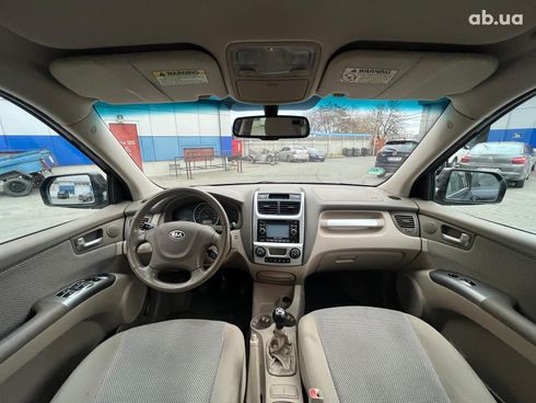 Kia Sportage 2010 черный - фото 21