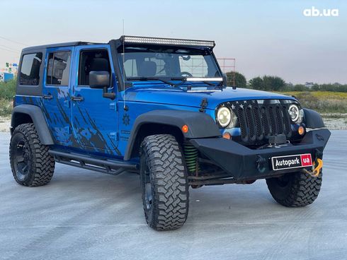 Jeep Wrangler 2014 синий - фото 7