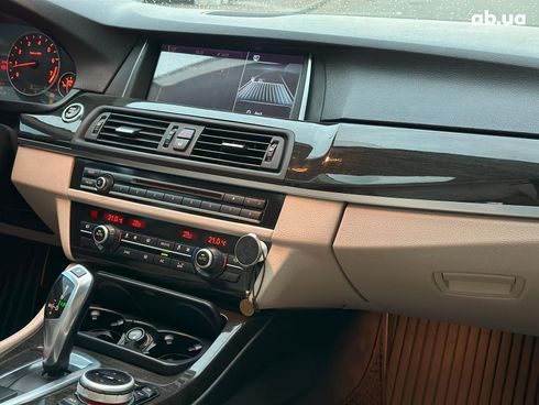 BMW 5 серия 2010 черный - фото 28