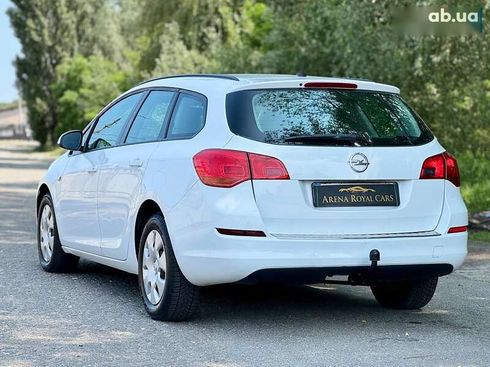 Opel Astra 2011 - фото 9