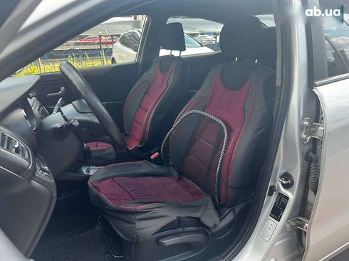 Kia Rio 2013 - фото 15