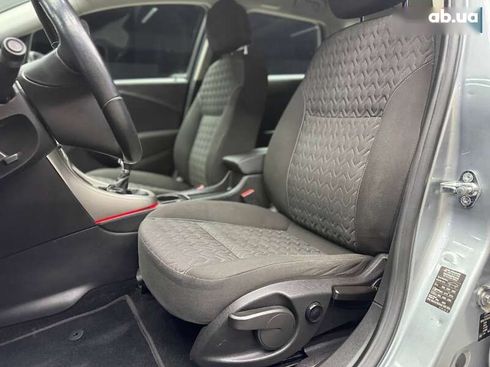 Opel Astra 2013 - фото 8