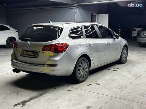 Opel Astra 2013 - фото 6