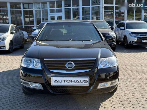 Nissan Almera 2012 - фото 2