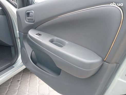 Nissan Almera 2007 серый - фото 20