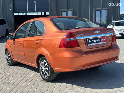 Chevrolet Aveo 2007 оранжевый - фото 6