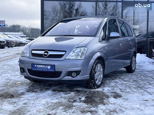 Opel Meriva 2009 - фото 8