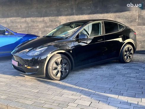 Tesla Model Y 2024 - фото 24