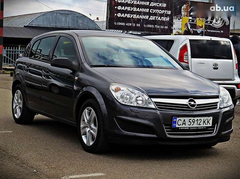 Opel Astra 2009 - фото 2