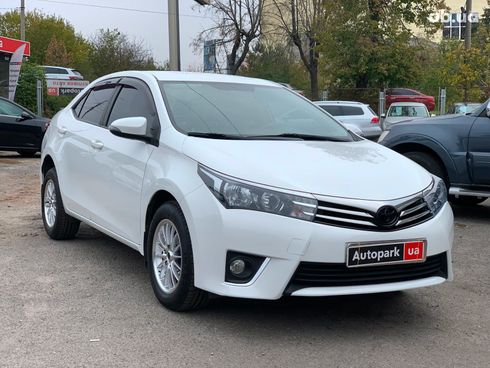 Toyota Corolla 2016 белый - фото 6