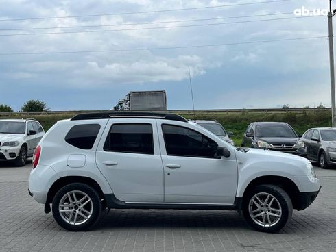 Renault Duster 2010 белый - фото 7
