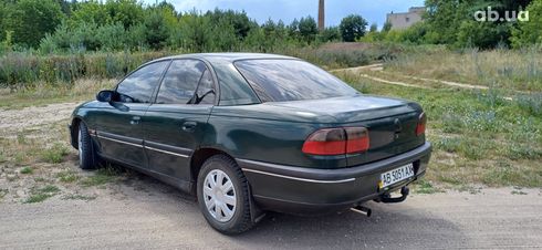 Opel Omega 1994 зеленый - фото 7