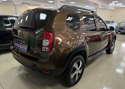 Dacia Duster 2010 коричневый - фото 5