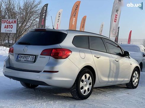 Opel Astra 2011 - фото 13