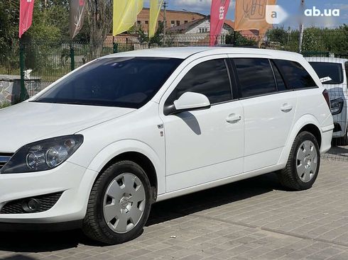 Opel Astra 2010 - фото 11