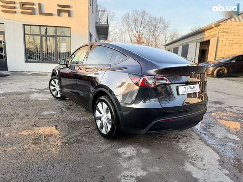 Tesla Model Y 2024 - фото 17