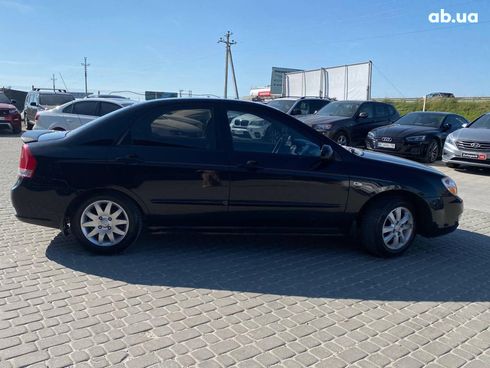 Kia Cerato 2008 черный - фото 9