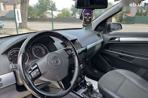 Opel Astra 2009 - фото 10