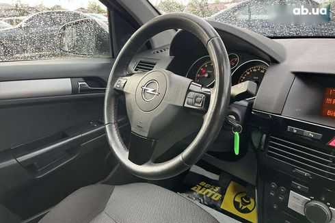 Opel Astra 2010 - фото 28