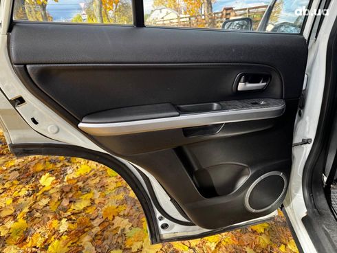 Suzuki Grand Vitara 2010 белый - фото 21