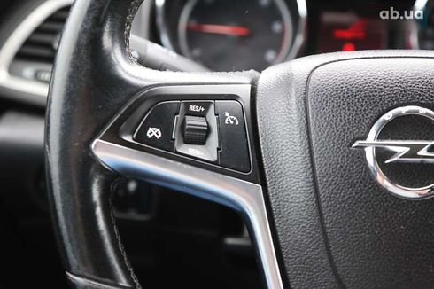 Opel Astra 2011 - фото 24
